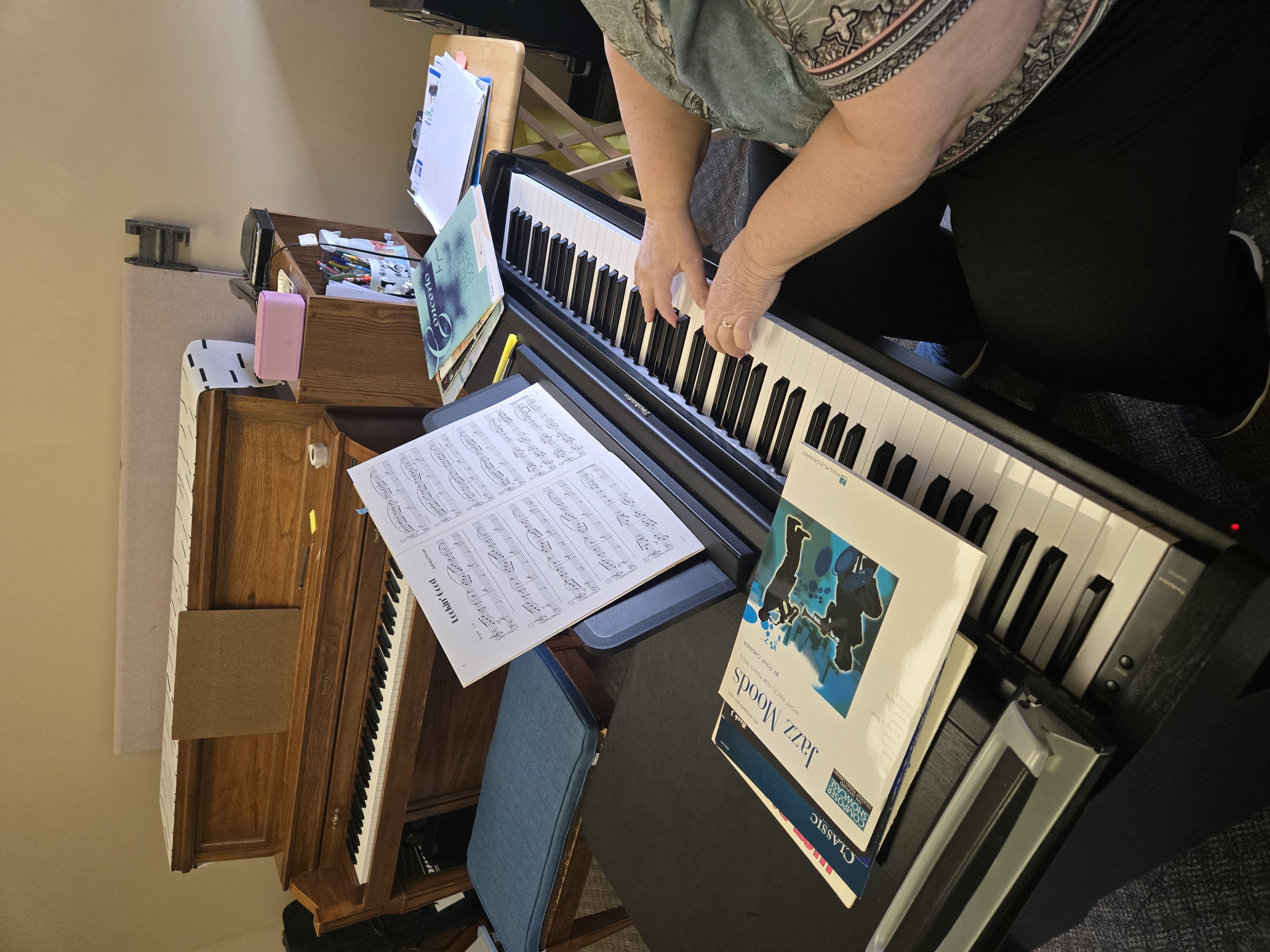 Keyboard student playing at the piano